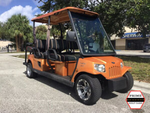 Orange Tomberlin 6 Passenger Lifted Golf Cart golf cart rental bartram springs, bartram springs golf cart rental